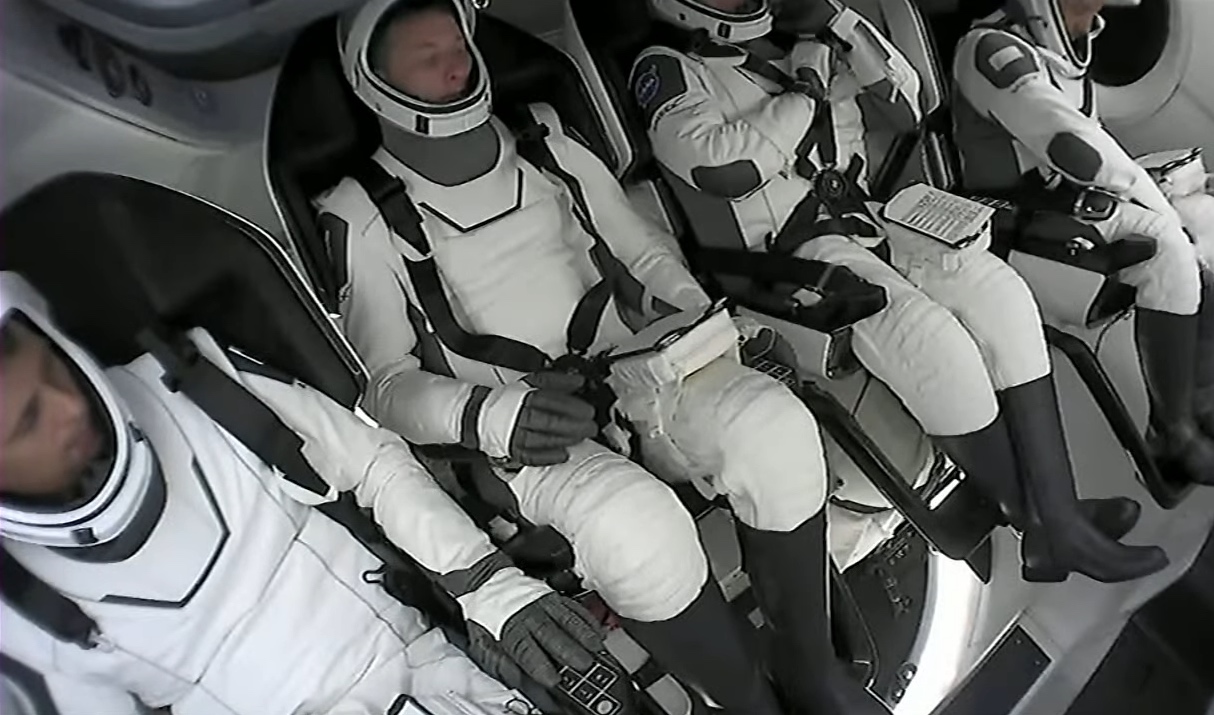Crew-6 astronauts aboard a SpaceX Crew Dragon capsule.